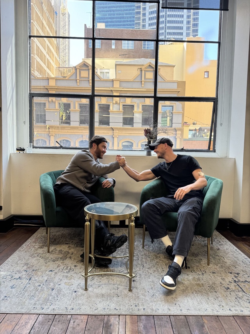 Two MAP consultants shaking hands in the office