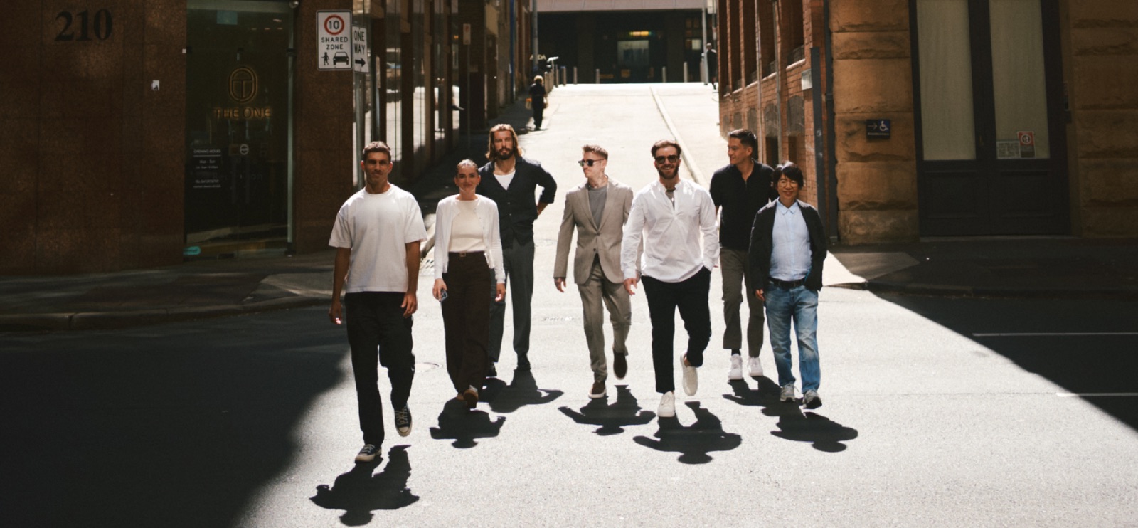 The MAP Talent team walking through a Sydney laneway